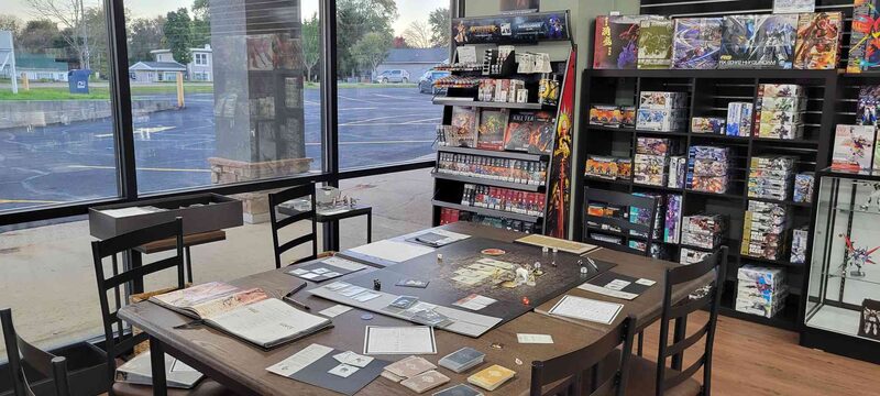 A game laid out on a table beside the front window
